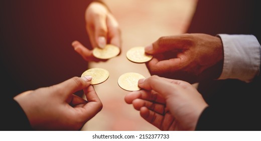 Close-up photo of Bitcoin, business people holding coins together Cryptocurrency Market Trends Bitcoin Stock Growth Investing in Virtual Assets investment platform Investing in today's world  - Shutterstock ID 2152377733