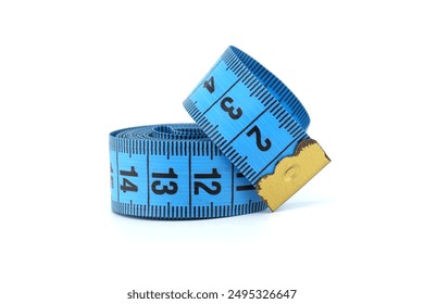 Close-up photo of a blue measuring tape neatly rolled up against a plain white backdrop, used for measurements and tailoring. - Powered by Shutterstock