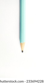 A close  up photo blunt wooden pencil the top center 