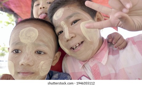 Close-up Photo Of Burmese Children With Makeup From Tanaka.