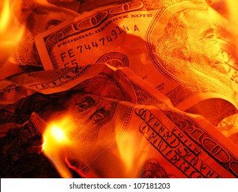 Closeup photo of burning dollars