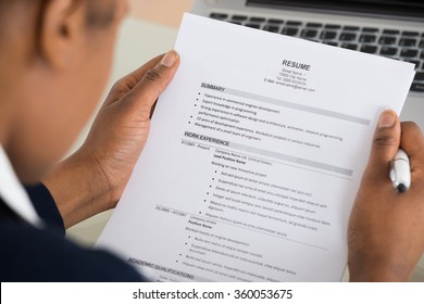 Close-up Photo Of A Businesswoman Holding Resume - Shutterstock ID 360053675