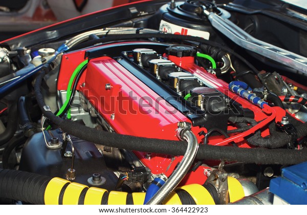 Closeup photo\
of a clean motor block in sport\
car.