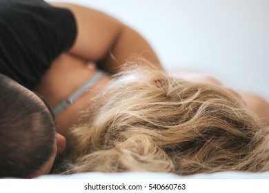Closeup Photo Of Couple Sleeping - Hugging, Top Of Their Heads With No Recognizable Faces, Anonymous - Focus On The Girl's Hair