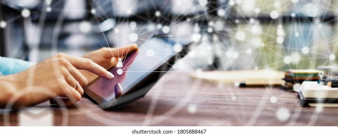 Close-up photo of female hands with digital tablet. Young woman working remotely at home. Concept of networking or remote work. Global business network. Online courses. - Shutterstock ID 1805888467