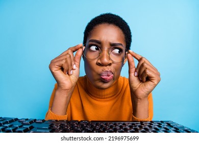 Close-up photo of funky funny grumpy face of businesswoman thinking new project strategy isolated on blue color background - Powered by Shutterstock