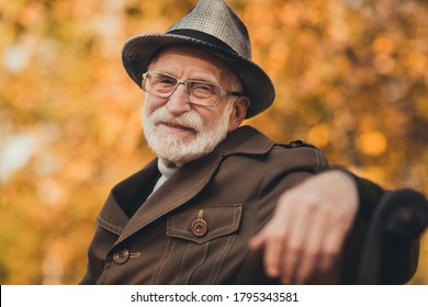 Closeup Photo Of Funny Glad Old Pensioner Grey Haired Grandpa Central Park Walk Enjoy Sunny Day Warm Weather Sit Bench Break Pause Wear Stylish Autumn Jacket Hat Specs Colorful Street Outside