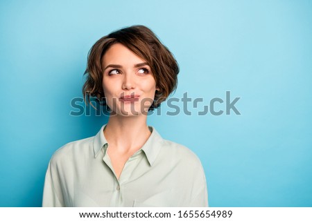 Closeup photo of funny lady short hairdo wondered look up empty space have creative business idea startup project wear casual green shirt isolated blue color background