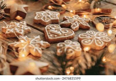 Close-up photo of gingerbread christmas cookies on wooden boards - Powered by Shutterstock