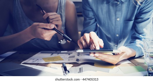 Closeup photo Girl Touching Screen Digital Tablet Hand.Project Producer Researching Process.Business Crew Working New Startup modern Studio.Analyze market stock,strategy.Blurred,film effect.Horizontal - Shutterstock ID 447405313