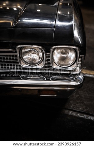 Close-up photo of headlights of an old classic car