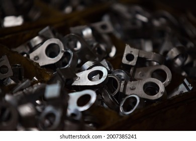 Close-up Photo Of Heap Of Accumulator Terminals. Rechargeable Battery Recycling Plant. Kazakhstan, Taldykorgan.