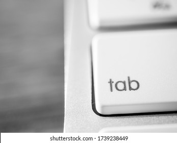 A Close-up Photo Of The Keyboard. Tab Key.