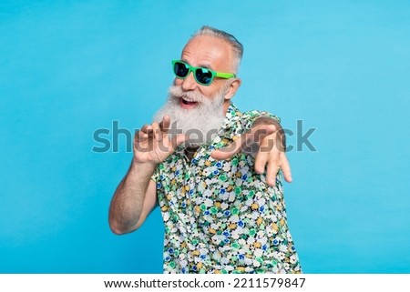 Closeup photo of old aged excited positive granddad wear green sunglass relax dancing wear shirt fingers point you isolated on blue color background
