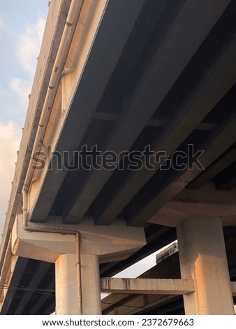 Close-up photo of overpass bridge, view under the bridge
