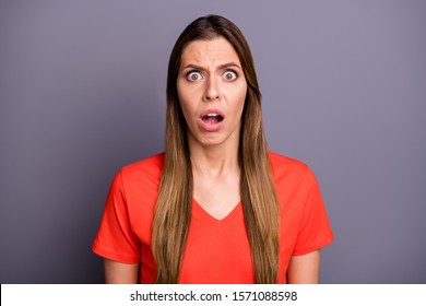 Closeup photo of pretty lady open mouth listening blaming not fair situation shocked unexpected wear orange t-shirt isolated grey color background - Shutterstock ID 1571088598