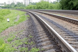 Close-up Photo Of Rails And Sleepers And Gravel