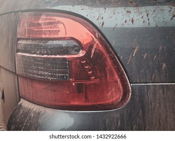 Closeup Photo Shoot Of Dirty Car's Headlight, Texture Of Mud On Silver Car.