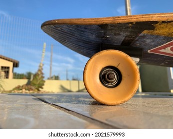 close-up photo of skateboard wheel blue sky - Powered by Shutterstock