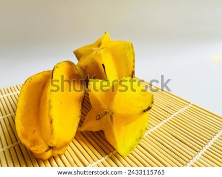 Close-up photo of star fruit or carambola. Sweet and sour fruit. Asian fruit.