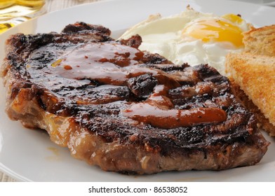 Closeup Photo Of Steak And Eggs For Breakfast