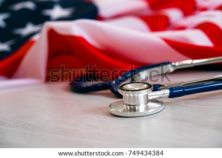 Close-up Photo Of Stethoscope On American Flag
