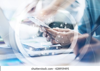 Closeup photo team job. Young business crew working with new startup project. Connections world wide interfaces. Analyze plans, keyboard. Blurred background, film effect. Horizontal - Powered by Shutterstock
