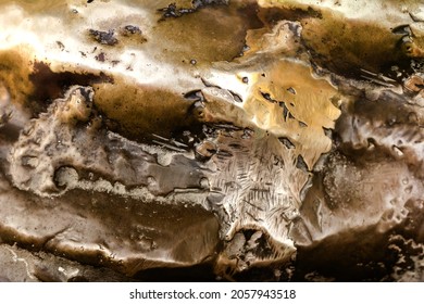 Close-up Photo Texture Of Copper Or Bronze Statue Material With Folds.