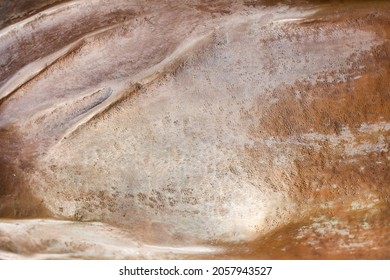 Close-up Photo Texture Of Copper Or Bronze Statue Material.