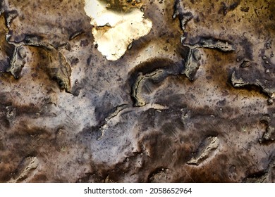 Close-up Photo Texture Of Copper Or Bronze Statue Material With Folds.