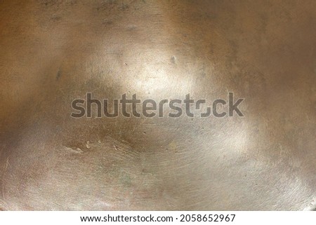 Close-up photo texture of copper or bronze statue material.