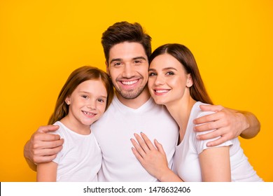 Closeup Photo Of Three Family Members Hugging Happy Together Wear Casual Outfit Isolated Yellow Background