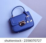 Close-up photo of a top-handle royal blue leather women