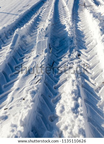 Similar – snow tracks Winter Ice