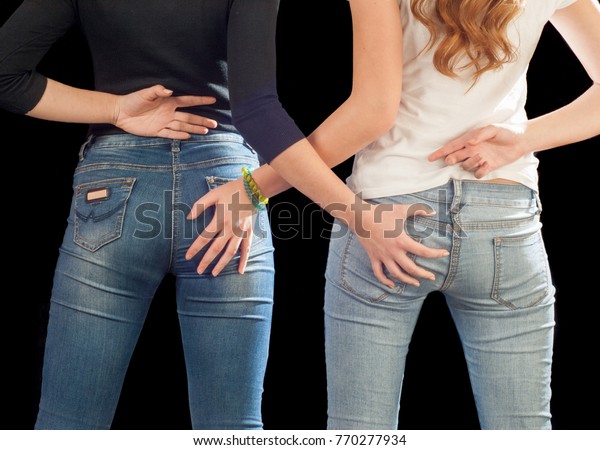 Two hands in ass
