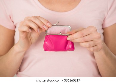 Close-up Photo Of Woman Holding Small Purse