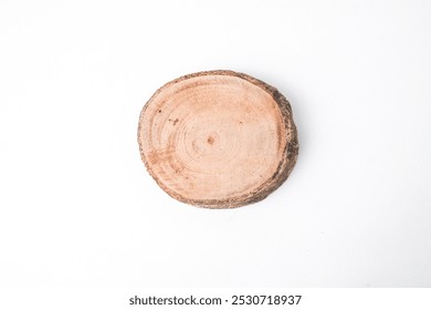 Close-up photo of Wooden cutting board or drink coaster made from cutted whole tree trunk isolated on white background. Shot on High angle flat lay setup. - Powered by Shutterstock