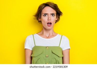 Closeup Photo Of Young Angry Lady Wear Khaki Overalls Open Mouth Dont Like New Movie Shocked Reaction Speechless Isolated On Yellow Color Background