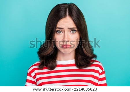 Closeup photo of young attractive gorgeous nice woman wear striped t-shirt pouted lips unhappy sad face cry problem offended isolated on cyan color background