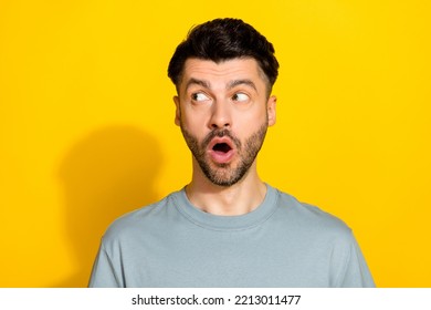 Closeup Photo Of Young Funny Excited Brunet Hair Bristle Man Open Mouth Dont Know What Say Big Offer Sale Look Empty Space Isolated On Yellow Color Background