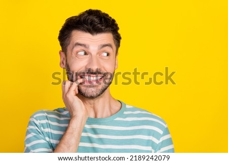 Closeup photo of young handsome man look empty space nervous about test examination isolated on yellow color background