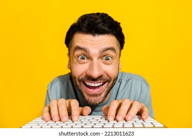 Closeup Photo Of Young Nerd Geek It Worker Online Distance Sitting Home Watching Youtube Videos Typing Keyboard Crazy Isolated On Yellow Color Background