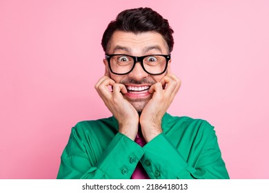 Closeup Photo Of Young Nervous Guy Bite Fingers Lips Smiling Can Not Wait Salary Isolated On Pink Color Background