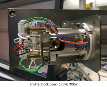 Closeup Photography Showing An Opened Mass Spectrometer And An Ion Source Assembly. Selected Focus.