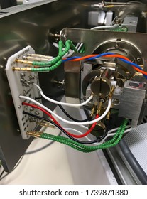 Closeup Photography Showing An Opened Mass Spectrometer And An Ion Source Assembly. Selected Focus.