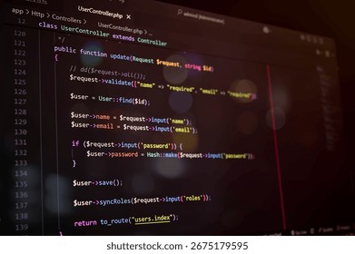 Close-up of PHP Laravel code on a dark editor screen, showcasing user update function and password hashing. Ideal for programming, coding, and web development concepts. - Powered by Shutterstock - Get 15% off with code: PIKWIZARD15