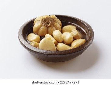 Close-up of pickled garlic with soy sauce on a jar, South Korea
 - Powered by Shutterstock