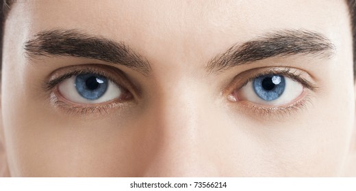 Close-up picture of blue eyes from a young man