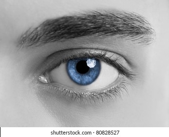 Close-up Picture Of Blue Eyes From A Young Man