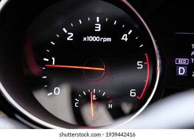 Closeup picture of a cars odometer.